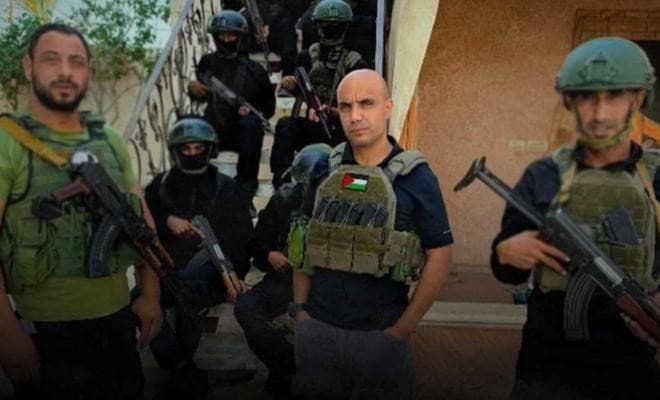 الخائن غسان الدهيني الي خلف العميل ياسر أبو شباب في قيادة إحدى ميليشيات العدو في غزة